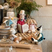 La Grande Famille characters are baking in the kitchen. Features a soft bunny toy, rabbit stuffed toy, dog soft toy, plush toy duck, wooden dolls house, toy mouse