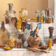 the sous mon baobab animals are mixing spices in their kitchen. Features a giraffe toy, lion plush toy and elephant baby toy